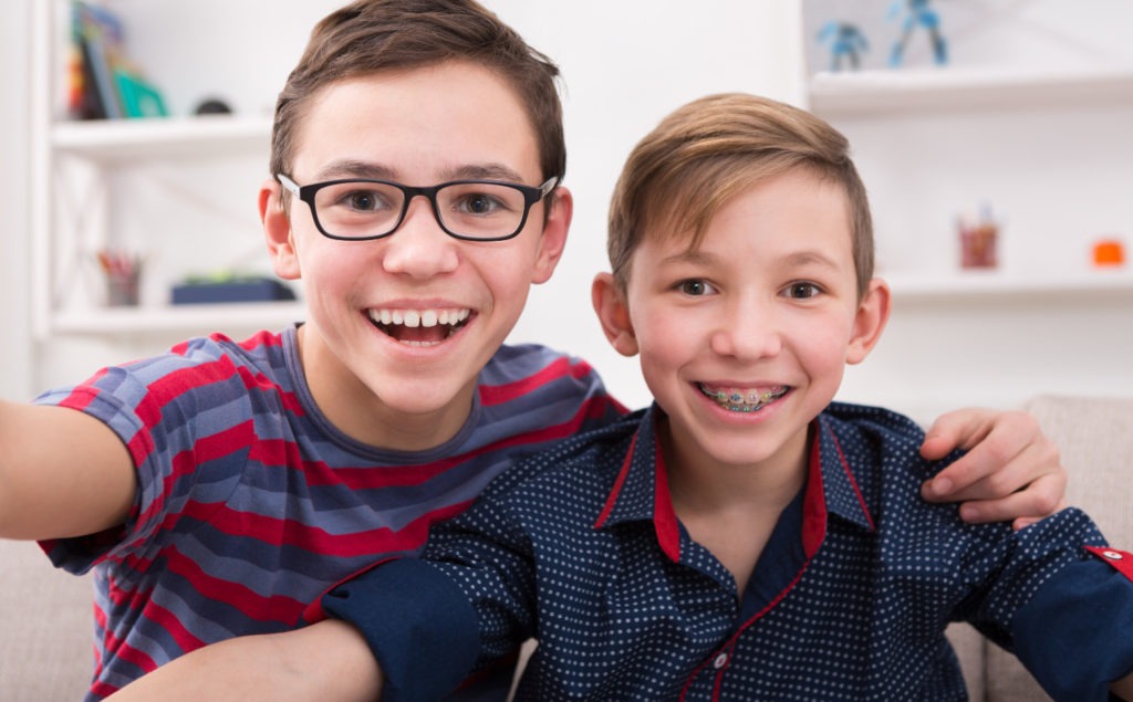 brothers smiling together