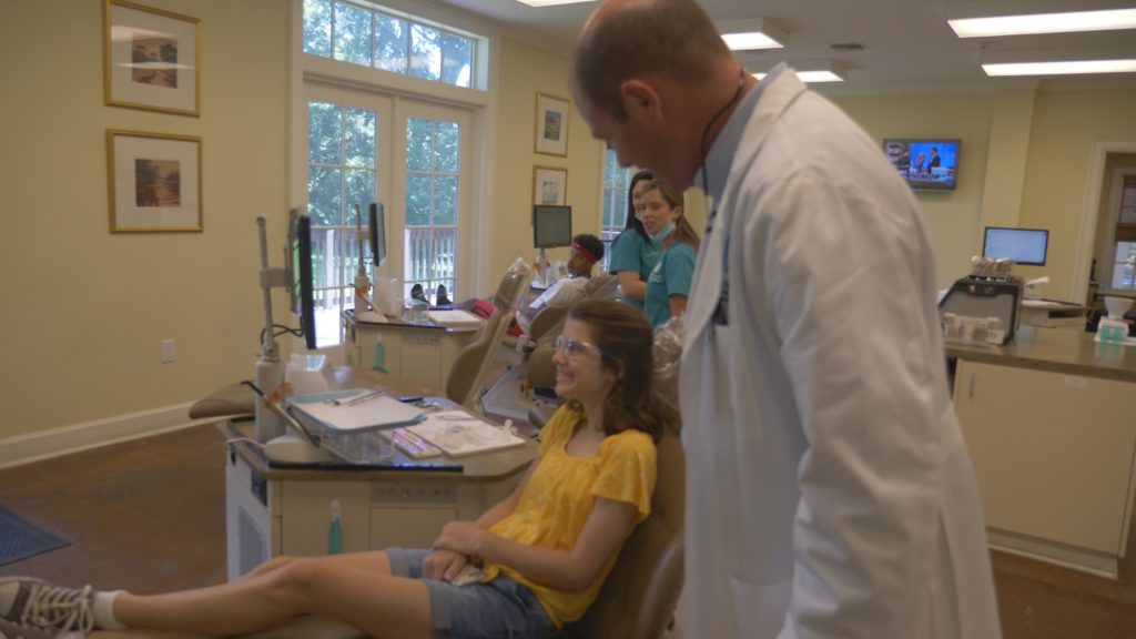 Dr. Bennett with a patient