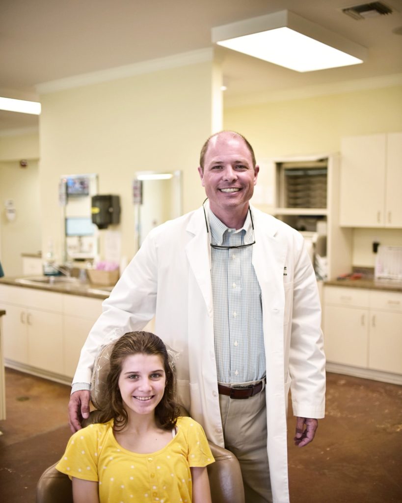 Dr. Todd Bennett with a patient